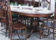 Double Tulip Pedestal Oval Dining Table